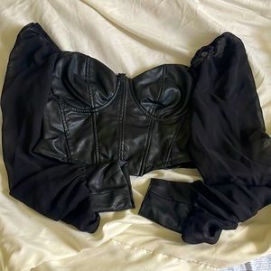 A leather cropped fancy black top, that’s perfect for a night out at the bar🍻